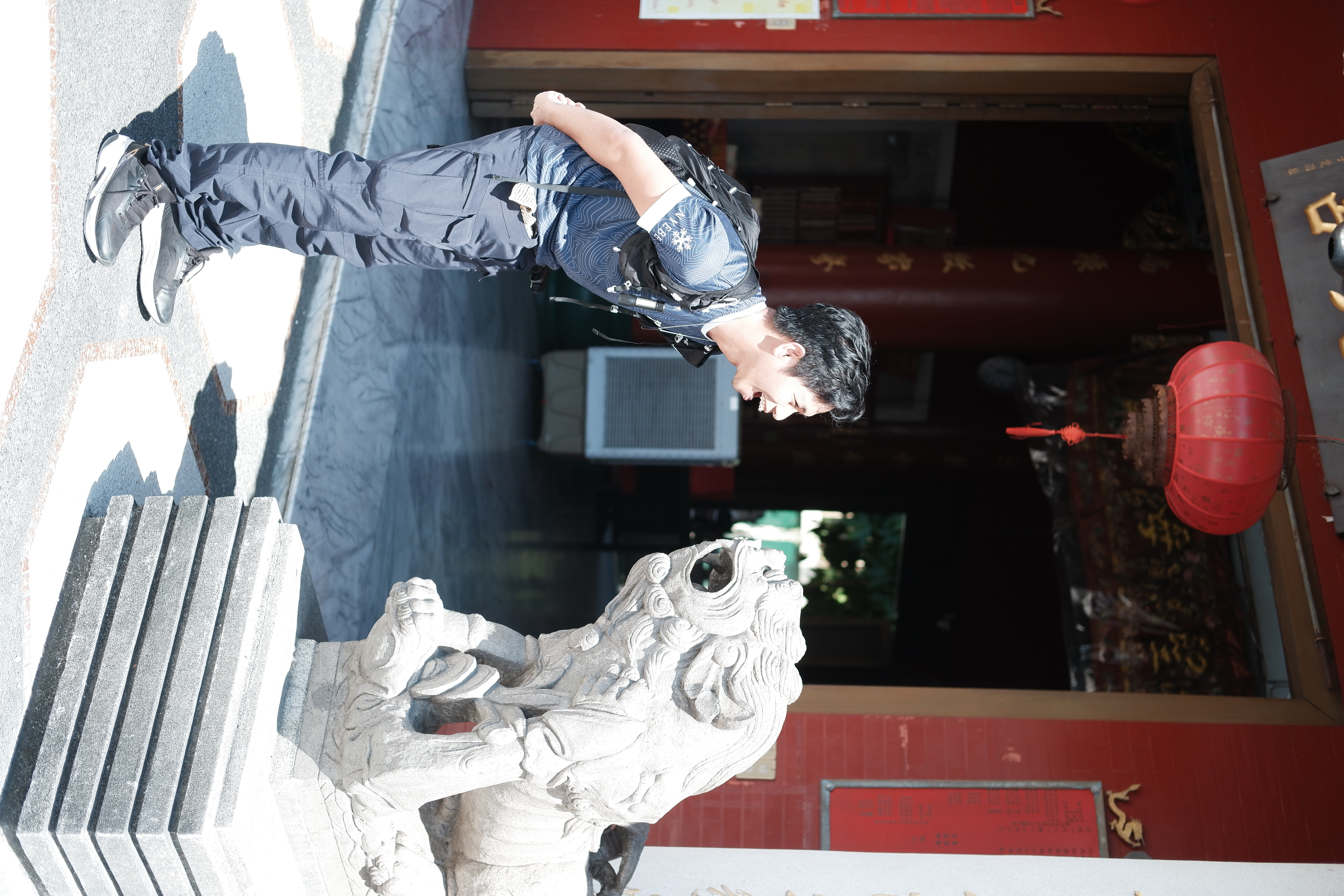 Travel moment outside a local temple entrance.